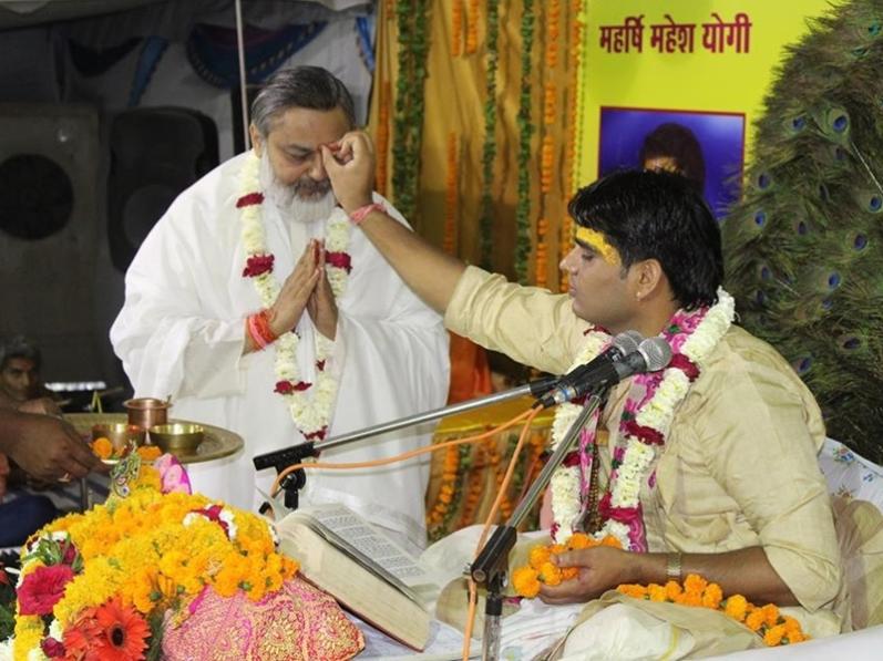 Acharya Updesh Krishna Shastri Ji is doing Tilak of Brahmachari Girish Ji on  5th april 2017   Ram Navami at Maharishi Ved Vigyan Vishwa Vidyapeetham campus Bhopal.